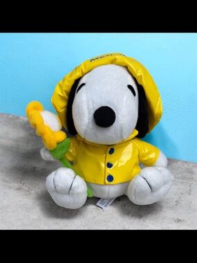 MetLife Peanuts Snoopy Plush in Yellow Raincoat with Yellow Flower